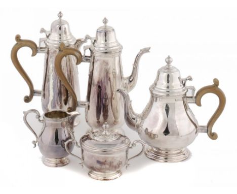 AN ELIZABETH II SILVER TEA AND COFFEE SERVICE with cut card decoration, coffee pot and lidded jug 28cm h, by A Haviland-Nye, 