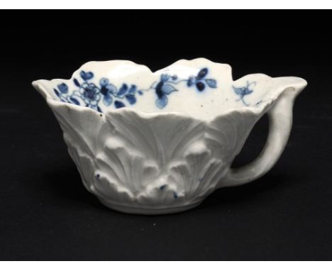 A WORCESTER BLUE AND WHITE BUTTER BOAT, C1760 in the Pickle Leaf Daisy pattern, 8cm l, workman's mark, collector's label Prov