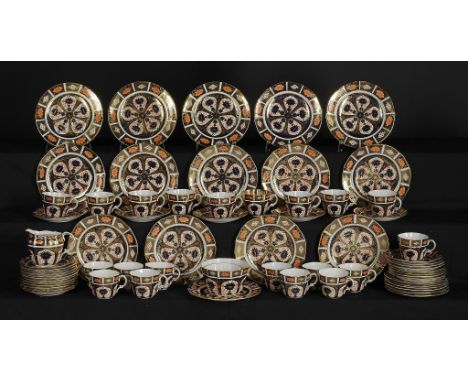 A ROYAL CROWN DERBY IMARI PATTERN TEA SERVICE, 1928 AND C comprising twenty four cups and an additional later cup, twenty fiv