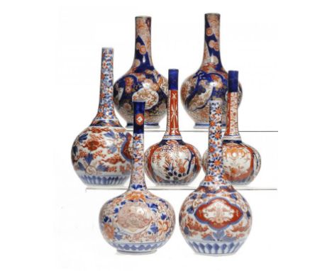 ONE AND THREE PAIRS OF JAPANESE IMARI BOTTLE VASES, MEIJI 21-25cm h ++One vase of the smallest pair with hairline crack in ba