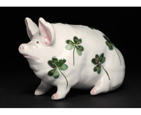 A WEMYSS WARE MODEL OF A PIGLET, C1900 10cm h, impressed mark and printed ovel mark of the retailer Thomas Goode & Co ++Left 
