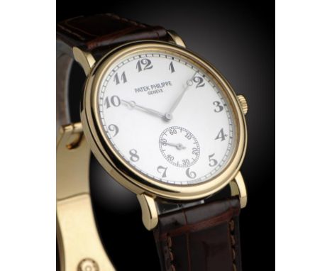 A PATEK PHILIPPE 18CT GOLD GENTLEMAN'S WRISTWATCH, CALATRAVA SERIAL NO 5022J0013 calibre 215 movement No 1870275/4096144, cro