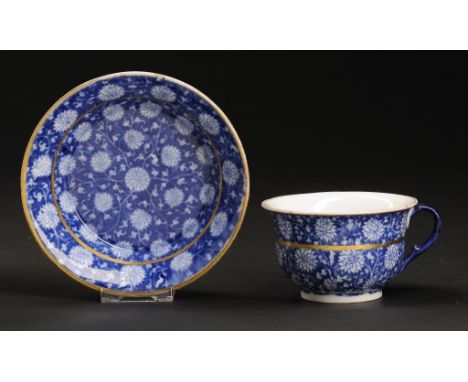 A COALPORT BLUE AND WHITE TEACUP AND SAUCER, JOHN ROSE & CO, C1805-10-C1815 with the Dahlia Sheet print, saucer 14cm diam ++L