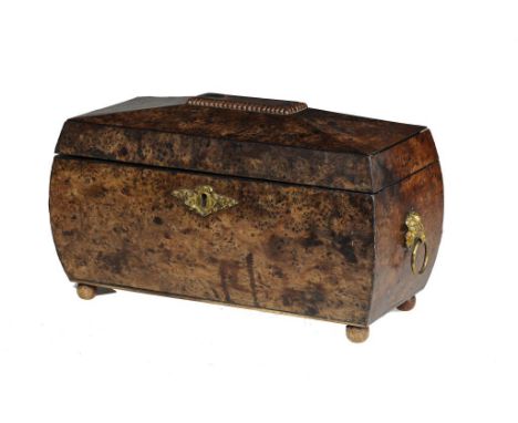 A WILLIAM IV BURR YEW WOOD TEA CADDY, C1835-40 with fitted interior containing the original pair of mahogany tea canisters, 3