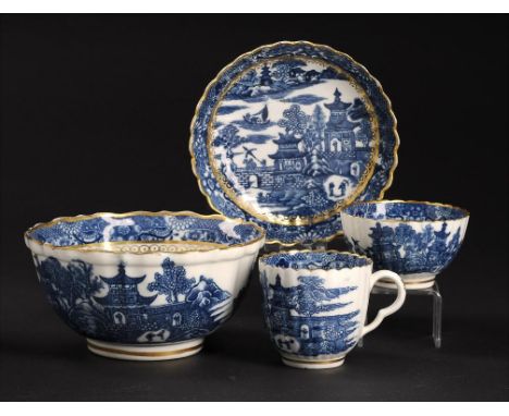 A CAUGHLEY BLUE AND WHITE ROYAL FLUTE SLOP BASIN AND MATCHING CAUGHLEY TRIO, C1779-88 printed with the Temple pattern, basin 