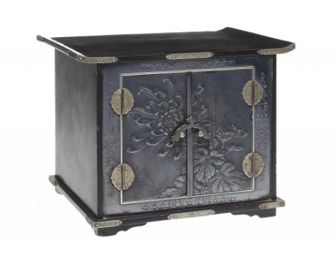 A JAPANESE SILVER MOUNTED LACQUER TABLE CABINET, MEIJI/TAISHO fitted with three drawers enclosed by a pair of doors engraved 