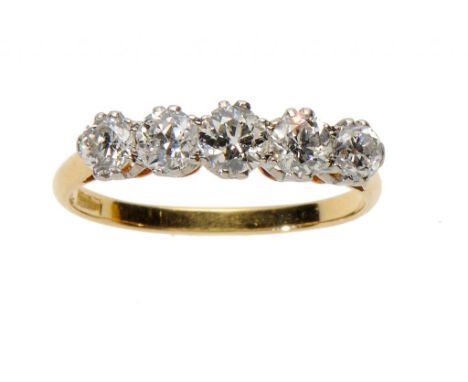 A DIAMOND FIVE STONE RING in gold, size Q ++In fine condition, the marks on the hoop erased