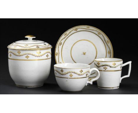 A CAUGHLEY POLYCHROME SUCRIER AND COVER AND TWO MATCHING CUPS AND A SAUCER, C1795 with undulating ribbon border, sucrier and 