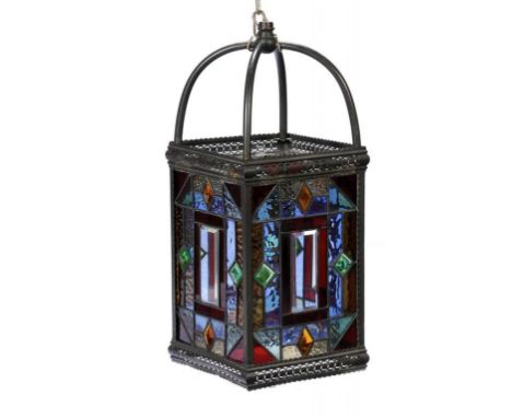 A VICTORIAN OXIDISED BRASS HALL LANTERN WITH LEADED GLASS LIGHTS, C1900 56cm h ++Originally with gas burner now lacking, the 