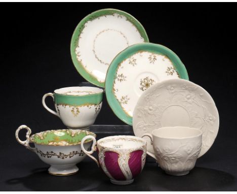 A RARE COALPORT PARIAN WARE CUP AND SAUCER AND THREE OTHER COALPORT TEA OR COFFEE CUPS AND TWO SAUCERS, 1841-50 various sizes