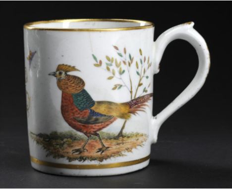 A COALPORT MUG, 1800-14 enamelled with a golden pheasant and flowers and insects flanking the gilt initial K, 8cm h Provenanc