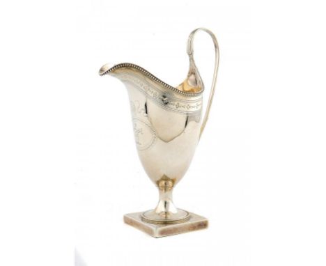 A GEORGE III SILVER ENGRAVED HELMET SHAPED CREAM JUG crested, 16cm h, by Hester Batemen, London 1788, 4ozs ++In very good con