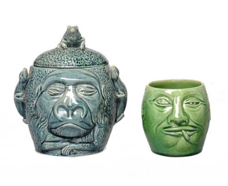 TWO RARE SALOPIAN ART POTTERY MAJOLICA GLAZED GROTESQUE JARS, MODELLED BY JAMES ARTHUR HARTSHORNE, C1908 jar and cover 18cm h