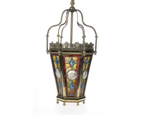 A VICTORIAN BRASS AND LEADED GLASS TAPERED HEXAGONAL HALL LANTERN, C1900 with coloured, faceted and cut glass quarries, 67cm 