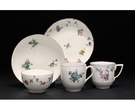 A DERBY TEA BOWL AND SAUCER AND TWO DERBY COFFEE CUPS AND ONE SAUCER C1777-84 with polychrome or green monochrome decoration,
