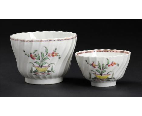 A CAUGHLEY POLYCHROME SHANKED SUCRIER AND MATCHING TEA BOWL, C1792-95 enamelled with the Pot of Flowers pattern, sucrier 8cm 