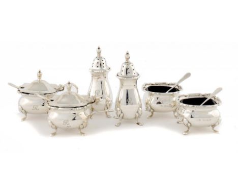 A GEORGE V SILVER SIX PIECE CONDIMENT SET with blue glass liners, pepper caster 8cm h, by Elkington & Co Ltd, Birmingham 1923