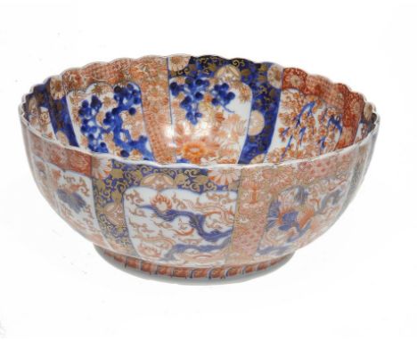 A JAPANESE IMARI FLUTED BOWL, MEIJI 31cm diam ++Wear to gilding on rim, some typical glaze scratches to the interior, not cra