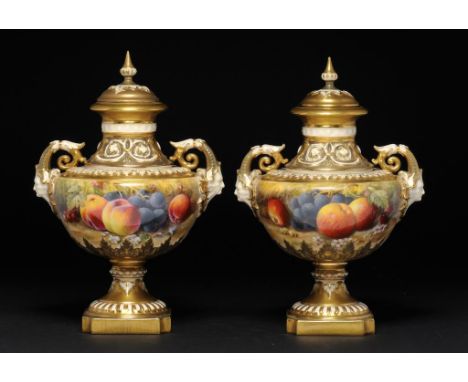 A PAIR OF ROYAL WORCESTER VASES AND COVERS, 1930 painted by Ricketts, both signed, with fruit, a smaller group of fruit to th