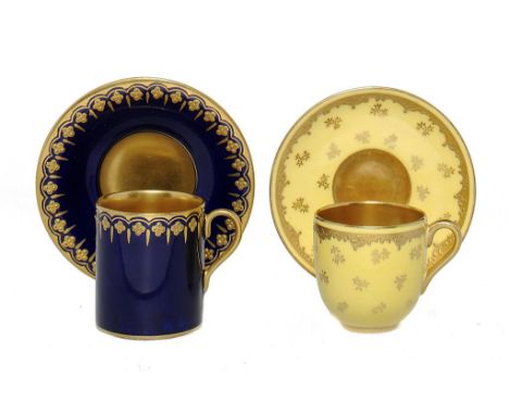 TWO COALPORT COBALT OR YELLOW GROUND COFFEE CUPS AND SAUCERS, 1910-1919 saucers 9.5 and 10cm diam, printed mark ++Yellow cup 