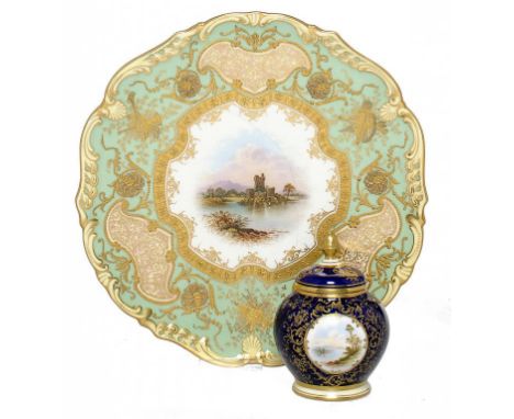 A COALPORT PLATE AND TOY POT POURRI JAR AND COVER, 1909 AND C painted with a landscape, one by E O Ball, signed, plate 23.5cm