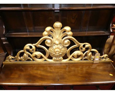 A 19th century Italian floral giltwood decorated pelmet cresting, with Prince of Wales feather carved detail and further all-