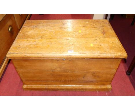 A Victorian stained pine hinge topped tool chest, with iron end carry handles, w.71cm 
