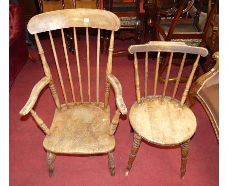 An early 20th century provincial elm &amp; beech stick back farmhouse armchair, width 57.5cm, together with a further early 2