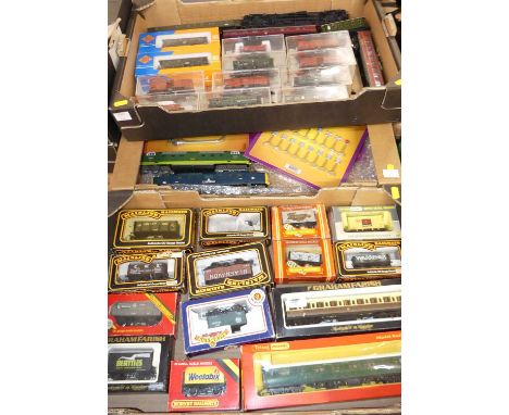 Three trays of H0/00 mostly boxed rolling stock, accessories, and others, specific examples to include Triang, Hornby SR brak
