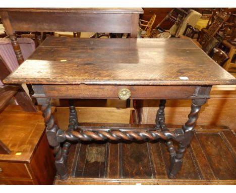 An antique oak single drawer side table, raised on spiral turned, bobbin and square cut supports, width 91cm