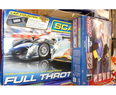 A Scalextric 1/32 scale electric full throttle set of Peugeot 908HD IFAP, and a Lola Austin Martin, together with a Microscal