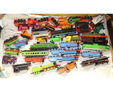 A tray containing a quantity of loose ERTL 1990s Thomas The Tank Engine locomotives and others