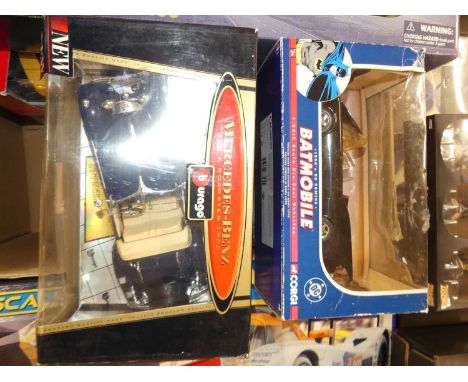 A quantity of large scale boxed modern issue diecast to include Burago Ferrari 360 Modena, Corgi 1960s Batmobile etc