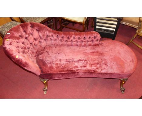 A mid-Victorian walnut framed and crushed rouge velvet button bcked upholstered chaise lounge, length 170cm