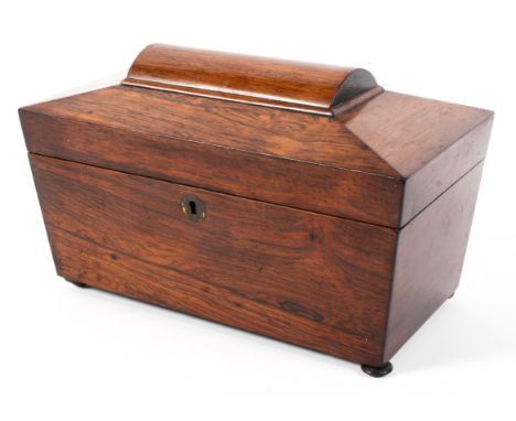 A 19th century rosewood sarcophagus shaped tea Caddy with twin compartments complete with mixing bowl.raised on bun feet, 30c