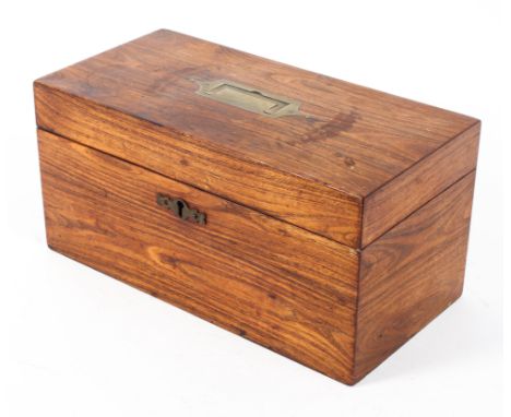 An early 19th century rosewood and brass mounted tea caddy, the interior fitted with central well and two caddy apertures, 31