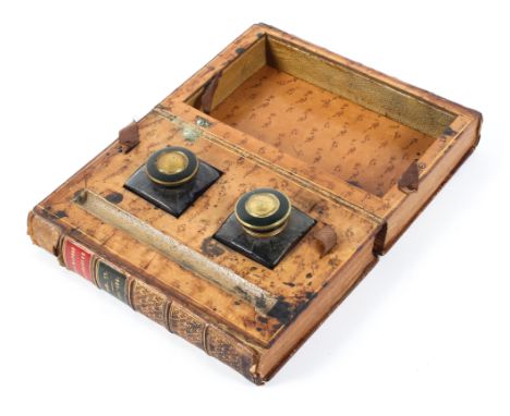 A 19th century twin inkwell in the form of a leather bound book titled Biographie Universelle, L 21cm x D 14cm x H 8cm