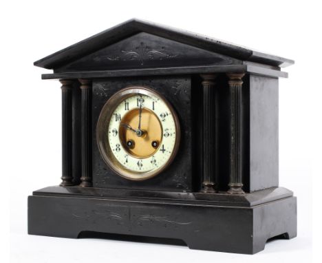 A Victorian slate eight day mantle clock, of architectural form, with four brass pillar supports, 23 cm high 