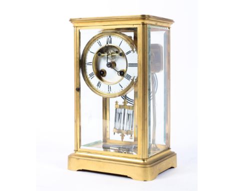 A French (Samuel Marti) striking brass eight day mantle clock, the white enamelled dial with Roman numerals and two winding h