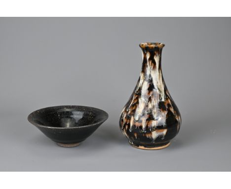 TWO CHINESE CERAMIC ITEMS. To include a Cizhou type pear shaped bottle vase, covered in a black lustrous glaze with white, bl