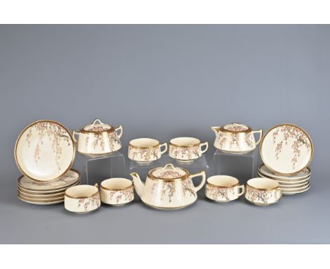 A JAPANESE TWENTY ONE PIECE SATSUMA WARE TEA SET, EARLY 20TH CENTURY. Set for six with cups, saucers, side dishes, teapot, su