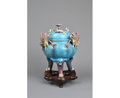 AN UNUSUAL CHINESE / JAPANESE FAHUA DECORATED BISCUIT TRIPOD CENSER, 19TH CENTURY OR EARLIER. A turquoise ground compressed g