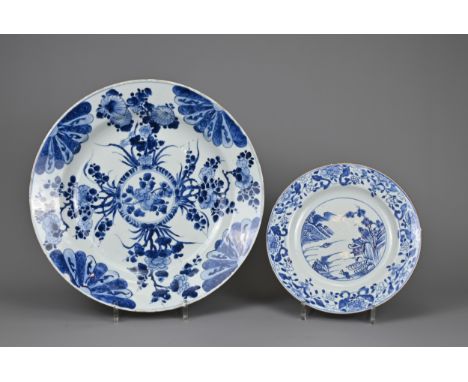 TWO CHINESE BLUE AND WHITE DISHES, 18TH CENTURY. To include a large Kangxi (1662-1722) deep dish with everted rim decorated w