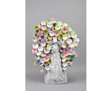 FABIENNE AUZOLLE b.1967 - TREE OF LIFE, PARIS 2015. Glazed ceramic sculpture of a female figure holding a bird surrounded by 