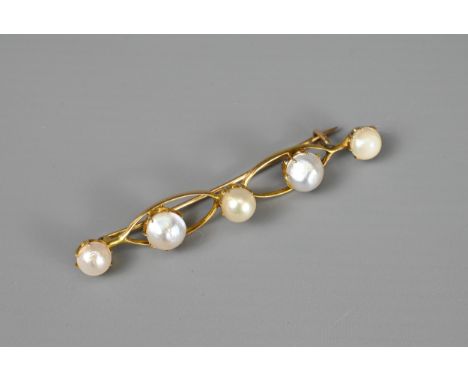 A CHINESE 20KT YELLOW GOLD AND PEARL MOUNTED BROOCH. Mounted with five graduated pearls within claw setting, on a pierced bar