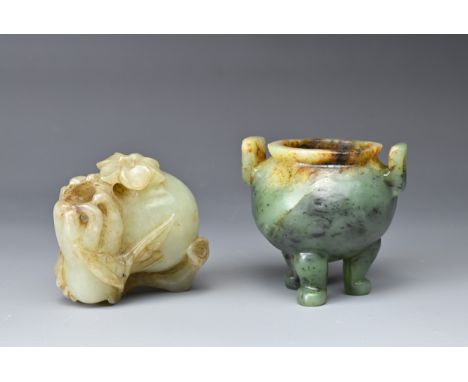 TWO CHINESE CARVED JADE ITEMS. Comprising: a tripod censer of mottled spinach colour, with upright geometric handles and a pa