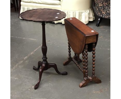 A mahogany wine table with shaped top; together with a bobbin turned small Sutherland table (2) 