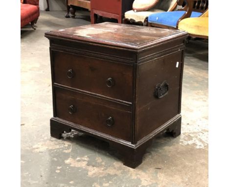 An 18th century oak commode stool with hinged lid, with two blind drawers, 47x41x48cmH 