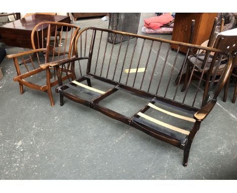 An Ercol style stickback sofa and armchair (cushions missing), the sofa approx. 175cmW 