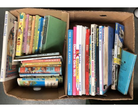 A mixed lot of vintage childrens books to include Puffin, Enid Blyton, Annuals etc 